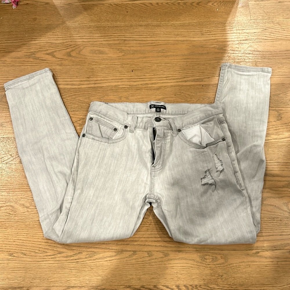 White ripped skinny jeans INC